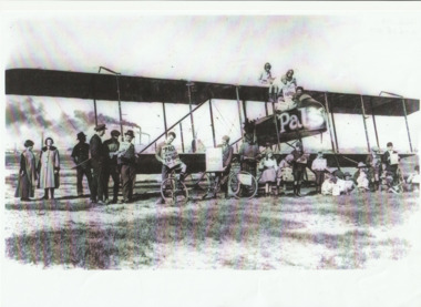 Photograph - Group of people with R Graham Carey's aeroplane, 22 Sep 1920