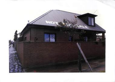 Photograph - NOT FOR SALE sign on the roof of Olive Zakharov's house, Little Swallow Street, Port Melbourne, 1990