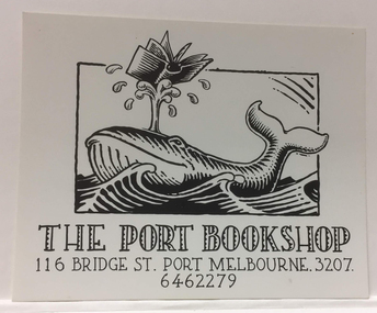 Business card for The Port Bookshop with address and phone number and an illustration of a whale balancing an open book on its water spout.
