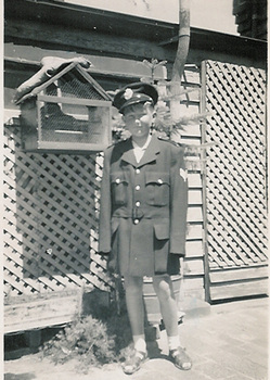 2309 - John Coghlan as a boy, dressed in father's police jacket and hat