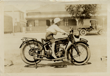 2349 - Boy on a Rudge-Whitworth motorbike in Bridge Street near corner of McCormack Street