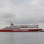 Ship perpendicular to a large pier.