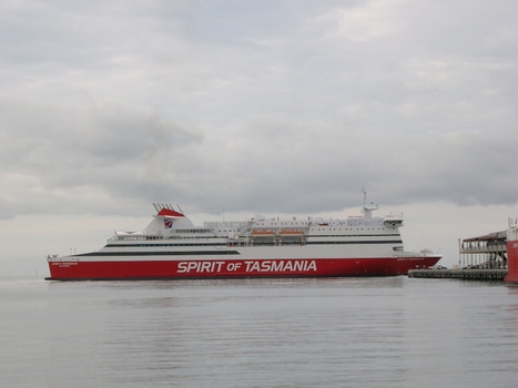 Ship perpendicular to a large pier.