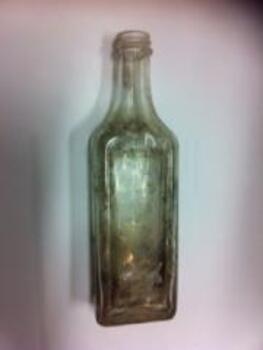 3720 - Clear glass bottle by Felton Grimwade & Duerdins, Ingles St, Port Melbourne