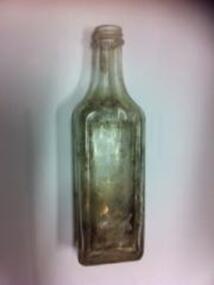 3720 - Clear glass bottle by Felton Grimwade & Duerdins, Ingles St, Port Melbourne