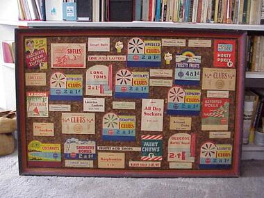 A display board with many labels from Lagoon Confectionery products.