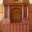 Large free standing piece of wooden furniture inscribed with words honouring the Nott Street School Old Boys who served during the Great War 1914 - 1919.