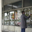 3493.10 - Doug Faram painting 'CLOSING DOWN up to 15% OFF' at Faram Bros Hardware Store