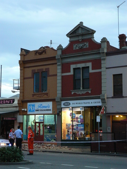 3500.03 - The scene after the pediment at Rene's Dry Cleaners, 301 Bay Street fell onto the footpath. 21 October 2007