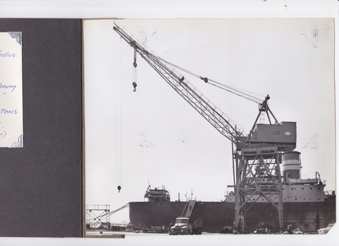 Moore luffing crane working shipside.  Erected 1963