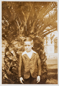 Photograph - Robert Cornelius Watters in front of palm tree c 1928