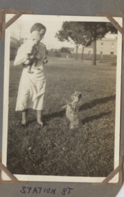 Photograph - Elsie Nicholson with Fred and dog in Page Reserve, 1940s