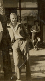 Photograph - Ernie Baker outside Ross St shop