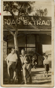 Photograph - Ernie Baker and friend outside Ross St shop