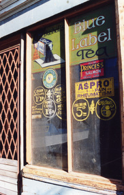 Photograph - Window advertising on Bellions grocer shop at 175 Stokes St, David Thompson, 1996