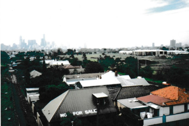 Photograph, James Lauritz, View towards city showing protest "Not For Sale" on roof, 1989 - 1990