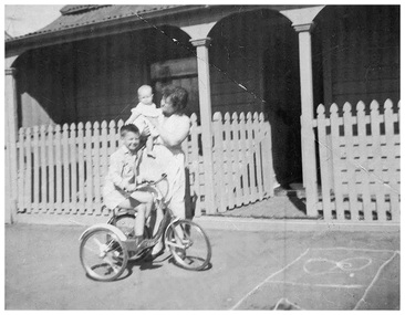 Photograph - Jean, Jenny & Roy Schink outside Heath Street home, 1959