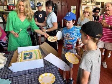 Photograph - PMTC, Sarah Bell handing out slices of 140th Anniversary Cake, Helen Barry, c2024