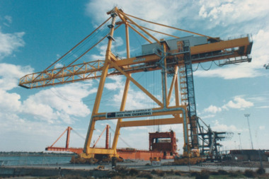 Photograph - Shipping using Webb Dock, Williamstown and various River Yarra berths. Container Crane, Ron Laing, 1986 - 1999