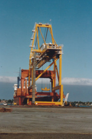 Photograph - Shipping using Webb Dock, Williamstown and various River Yarra berths. Container Crane, Ron Laing, 1986 - 1999