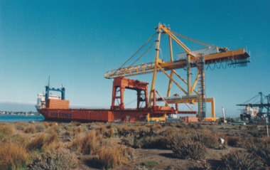 Photograph - Shipping using Webb Dock, Williamstown and various River Yarra berths. Container Crane, Ron Laing, 1986 - 1999