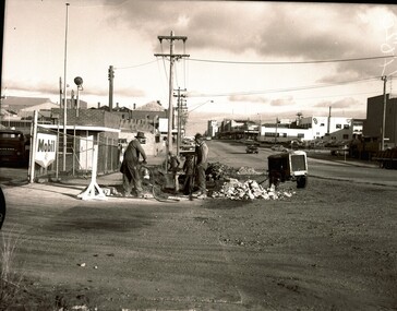 Armstrong St Nth near City Baths, men working