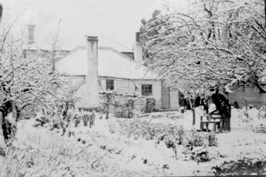 House in snow Mair st