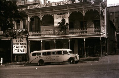 Unicorn Hotel with O'Brien's Comfort Coach parked in front
