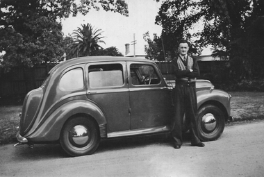 Ron Smith with car (owned fish shop at 1 Victoria St)