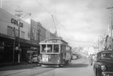 Tram in front of Coles Bridge st