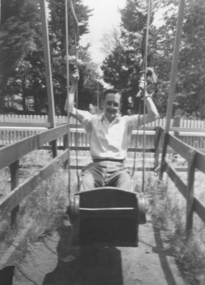 Ivan Bedford on swing boats Gardens 1946