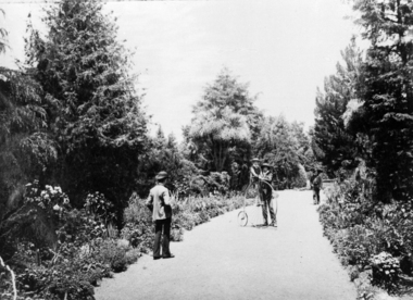 Riding a penny farthing at Gardens