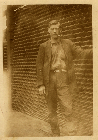 Albert Brogden with beer bottles, Ballarat Brewing Company