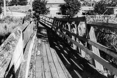 Film - Photograph by Herb Richmond. ca 1971, Skipton- Footbridge Over Emu Creek. No provision on road bridge for foot traffic. Note effect of flood waters