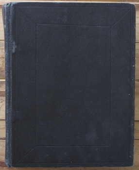 Navy blue debossed hard cover.