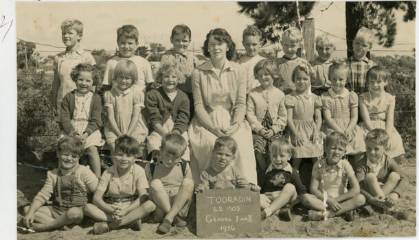 class photograph of 21 grade 1 and 2 pupils and their teacher at Tooradin State School SS 1503 in 1956 