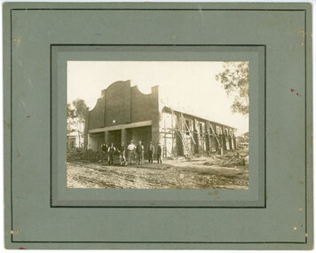 Photograph of the builders in front of the nearly completed Noble Park Public Hall