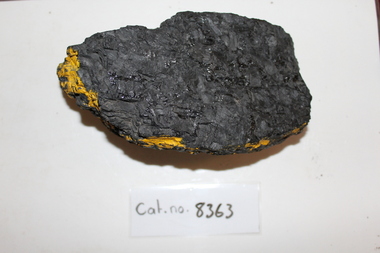 Yellow-painted coal