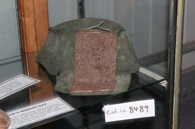 Dark green miners cap