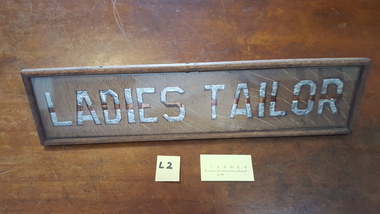 Framed sign, Ladies Tailor