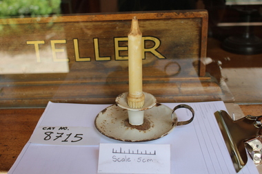 Moulded candle and candle holder