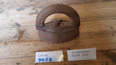 Wooden handled iron