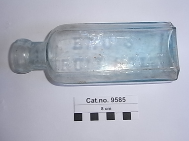 Bottle, glass, c. 1900-1912. ref. glass makers mark on base