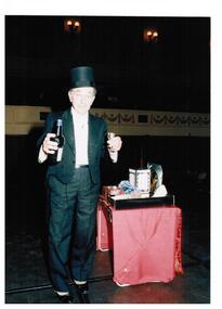 A magician is performing tricks.