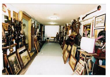 A basement with many items displayed.
