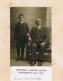 A photograph of an older man and a young boy.