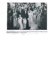 A large family group with the bride and groom.