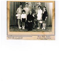 A studio family photograph.