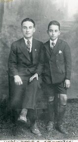 A young boy with a young man.
