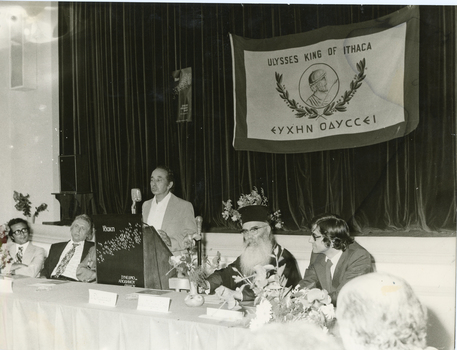 A man addressing a meeting.